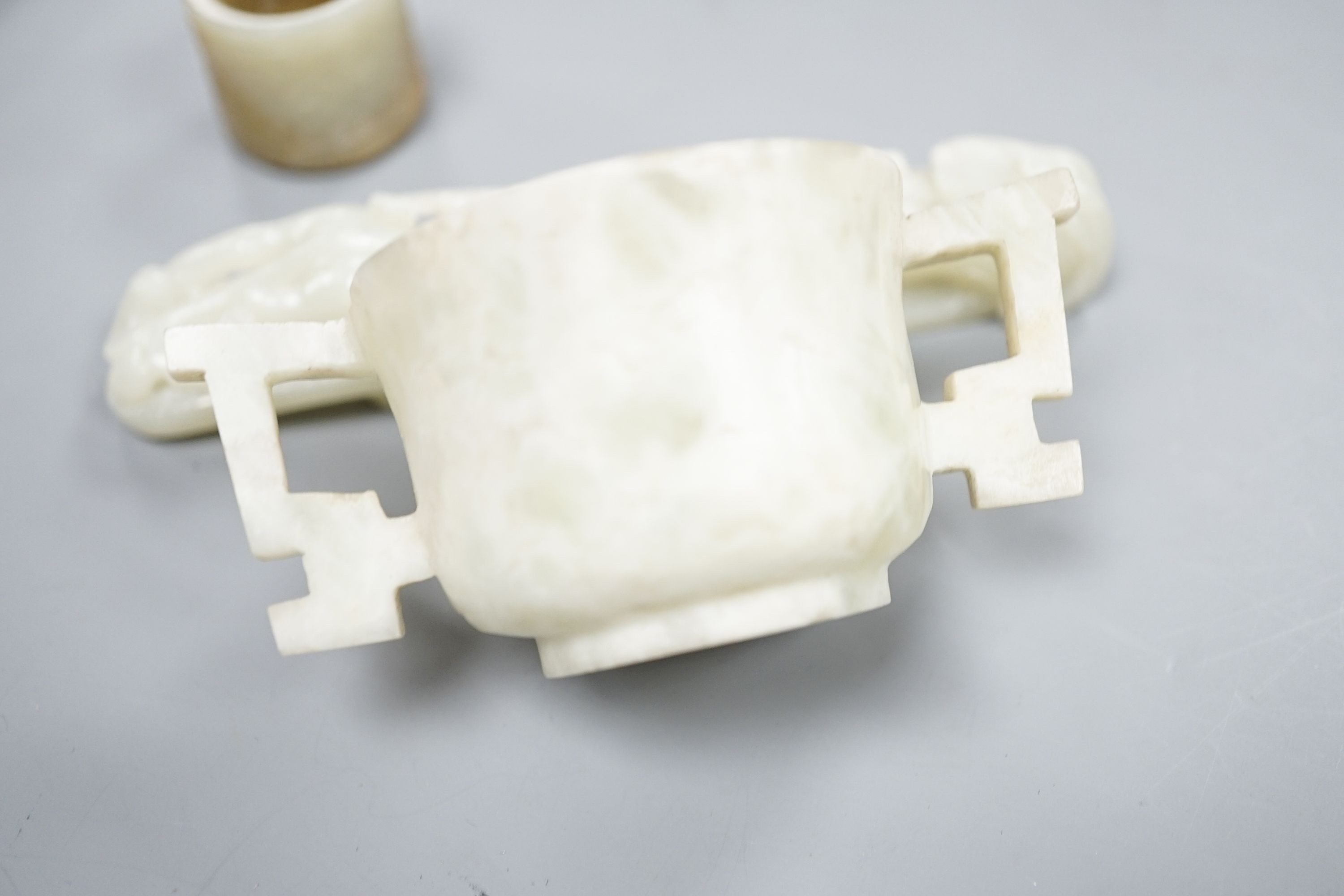 A Chinese jade belt hook, 12.5cm an archer's ring and figure, a stone cup and a glass snuff bottle